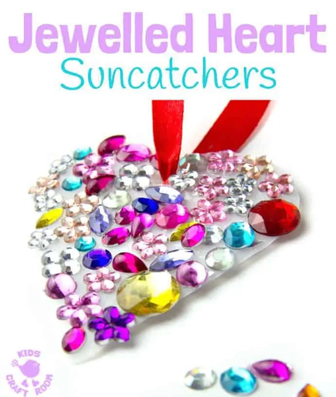 JEWELLED HEART SUNCATCHERS are so pretty! This is an easy recycled craft for kids and they make lovely gifts too. A great kids craft for Valentine's Day, Mother's Day and Summer. #valentine #valentinesday #valentinesdaycraft #valentinecraft #valentinescrafts #valentinecrafts #valentinesdayforkids #heart #love #heartcrafts #upcycledcraft #recycledcraft #suncatchers #suncatchercrafts #kidsart #ECE #kidscrafts #kidscraft #kidscrafts101 #craftsforkids #preschool #preK #earlyyears