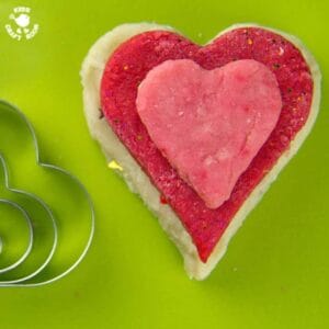 Rose Scented Sparkly Play Dough Recipe offers a fantastic sensory play activity for kids this Valentine's Day.