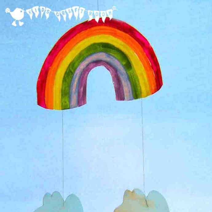 Make a colourful RAINBOW MOBILE - a fun recycled craft for kids.