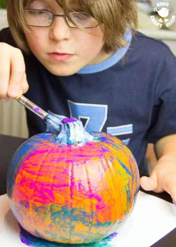 Pumpkin Painting is a Halloween craft for the whole family. Painted Pumpkins are an easy and safe pumpkin carving alternative for kids that look stunning!