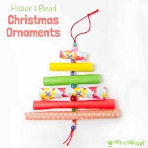 CHRISTMAS TREE PAPER ORNAMENTS - Have fun with paper & beads making adorable homemade Christmas ornaments in the shape of Christmas trees. Pretty enough for grown-ups, simple enough for kids! #christmas #christmascrafts #christmasideas #christmascraftsforkids #christmastree #papercrafts #paper #kidscrafts