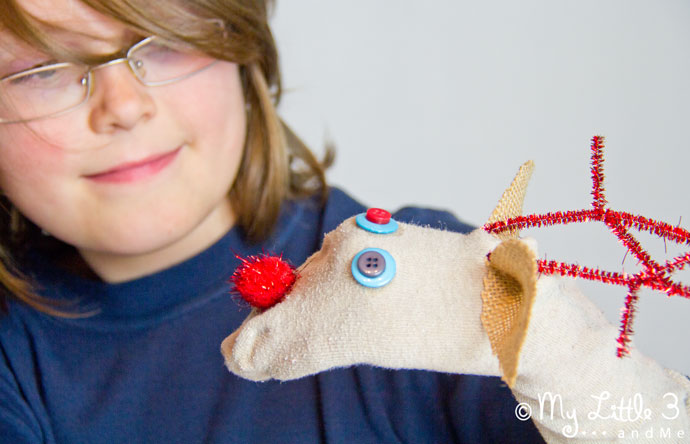 Put those old odd socks to good use and recycle them into adorable Christmas Reindeer No-Sew Sock Puppets. A great Christmas craft for kids.