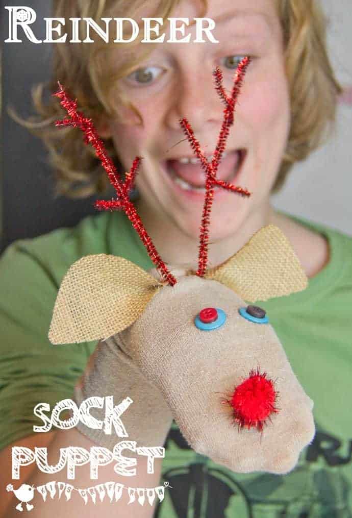 Put those old odd socks to good use and recycle them into adorable Christmas Reindeer No-Sew Sock Puppets. A great Christmas craft for kids. #reindeer #reindeercrafts #kidscrafts #christmascrafts #puppets #recycledcrafts 