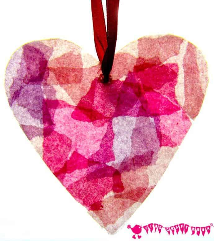 STAINED GLASS HEART SUNCATCHERS are so pretty. This is an easy and fun Valentine's Day craft for kids. They make lovely Valentine decorations and Valentine gifts and they're great as a Mother's Day craft idea too. #kidscraftroom #valentinesday #valentines #valentinecrafts #valentinesgifts #valentinesdaydecorations #kidscrafts #mothersday #mothersdaycrafts #heartcrafts #recycledcrafts via @KidsCraftRoom