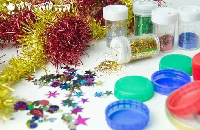 Christmas Lid Ornaments are a fabulous and frugal Christmas craft for kids. Nothing says Christmas more than homemade decorations does it?
