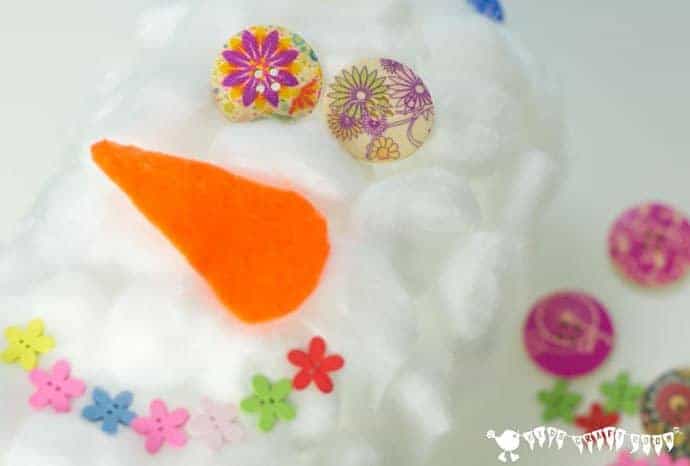 These fluffy Snowman Luminaries look cute during the day and just adorable glowing in the evenings! An easy and frugal recycled snowman craft for kids.