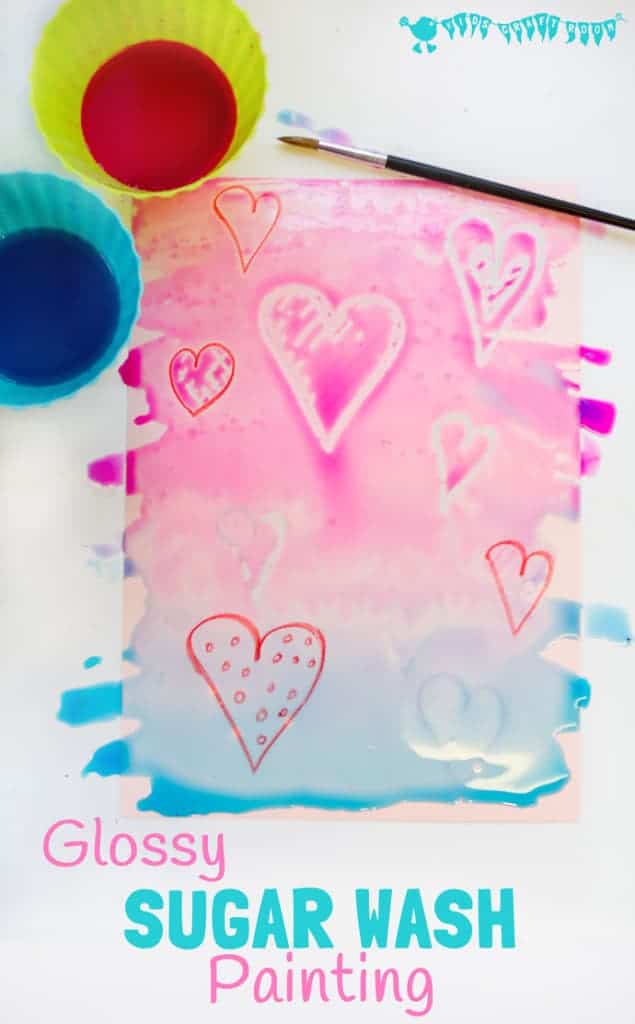 WAX RESIST SUGAR WASH PAINTING is a special and unusual painting activity for kids. It's colourful, glossy and finger licking good fun! Kids will love it! #valentine #valentinesday #valentinescraft #valentinecraft #valentinescrafts #valentinecrafts #valentinesdayforkids #heart #love #kidsart #processart #painting #paintingideas #kidspainting #paintingforkids #heartcrafts #kidscrafts #craftsforkids #kidsactivities #activitiesforkids #preschool #ECE