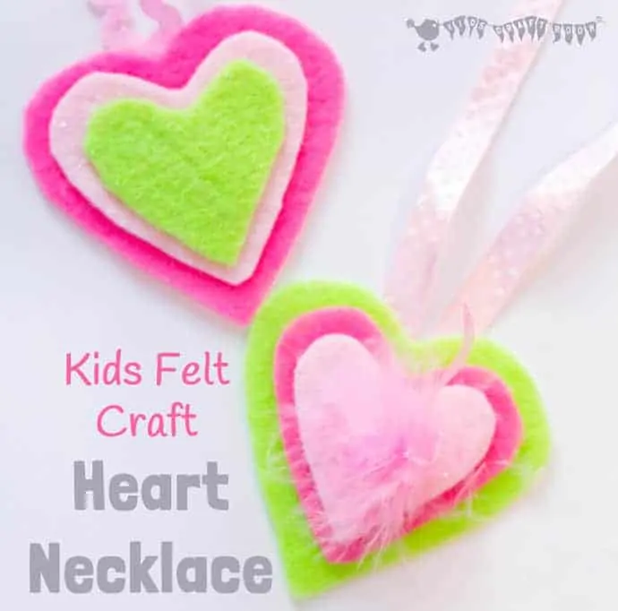 HEART NECKLACES are cute, colourful and no-sew! This kids felt craft is a great way for children to make homemade jewellery for themselves or as cute gifts. A lovely Mother's Day craft or Valentine's Day Craft for kids. #valentine #valentinesday #valentinescraft #valentinecraft #valentinescrafts #valentinecrafts #valentinesdayforkids #heart #love #heartcrafts #sewingforkids #homemadejewllery #necklace #DIYnecklace #feltcrafts #kidscrafts #craftsforkids #kidscraftroom #craftideasforkids