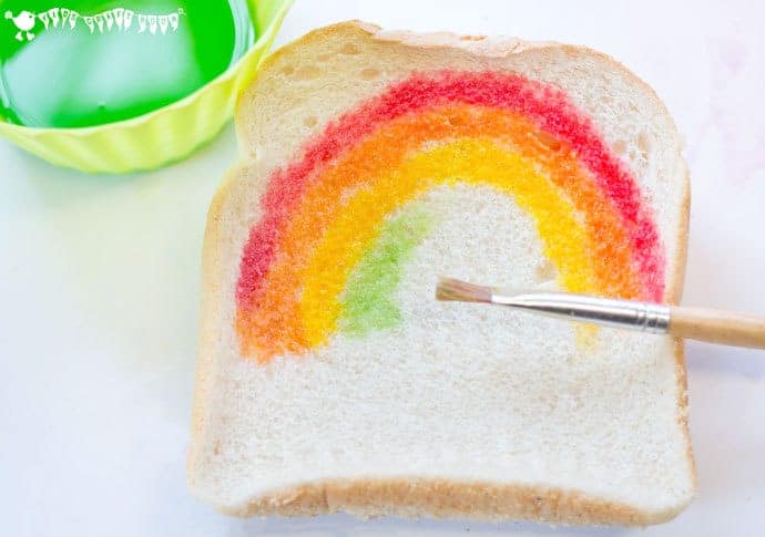 ART YOU CAN EAT is such fun! Check out our easy EDIBLE PAINT RECIPE and get the kids busy creating their own RAINBOW BREAD MASTERPIECES. 