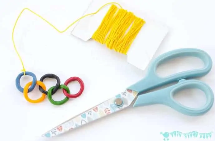 This Olympic craft for kids is a great way to get them interested and involved in the exciting sporting event. Boys and girls will love to make and wear this Olympic Rings Kids Necklace.