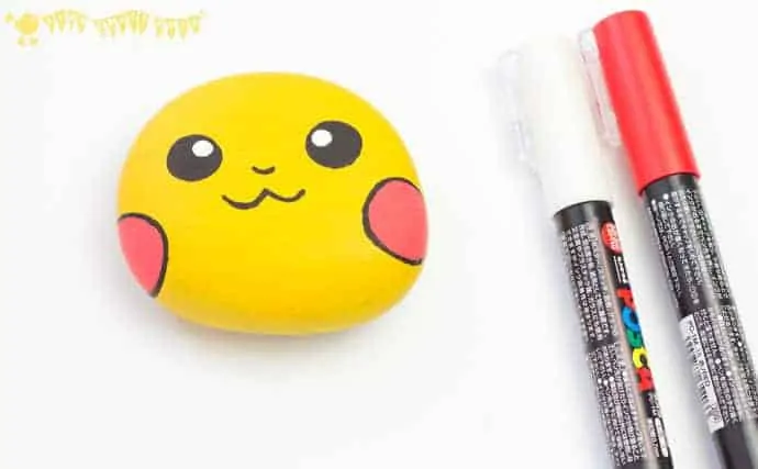 adding-detail-to-Pikachu-craft-a-cute-pebble-Pokemon-DIY