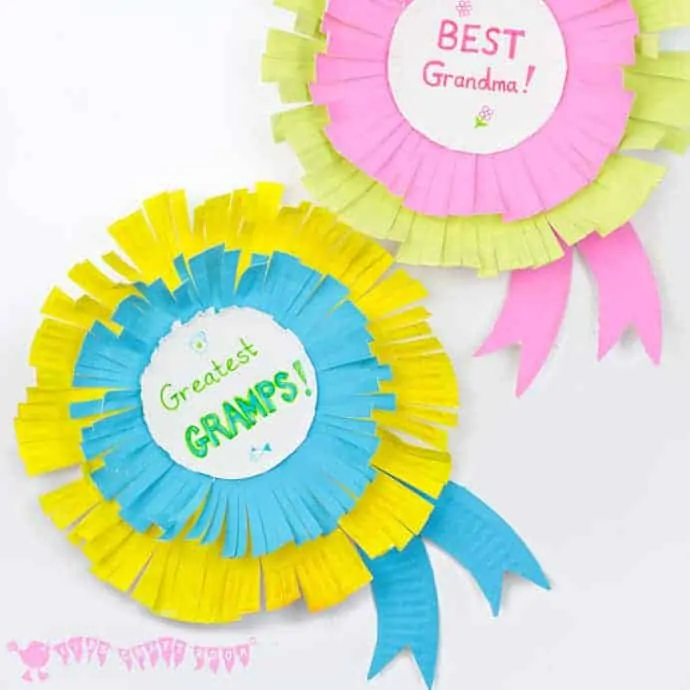 Paper Plate Rosettes are a great Grandparent's Day Craft. Every Granny and Grandad will feel appreciated receiving a personalised award they can wear too!
