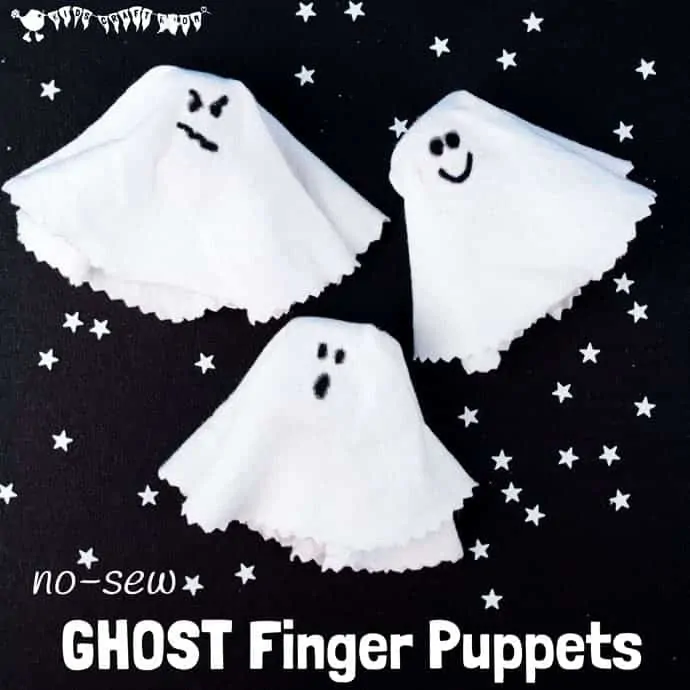 3 GHOST FINGER PUPPETS with different facial expressions lying on a black background.