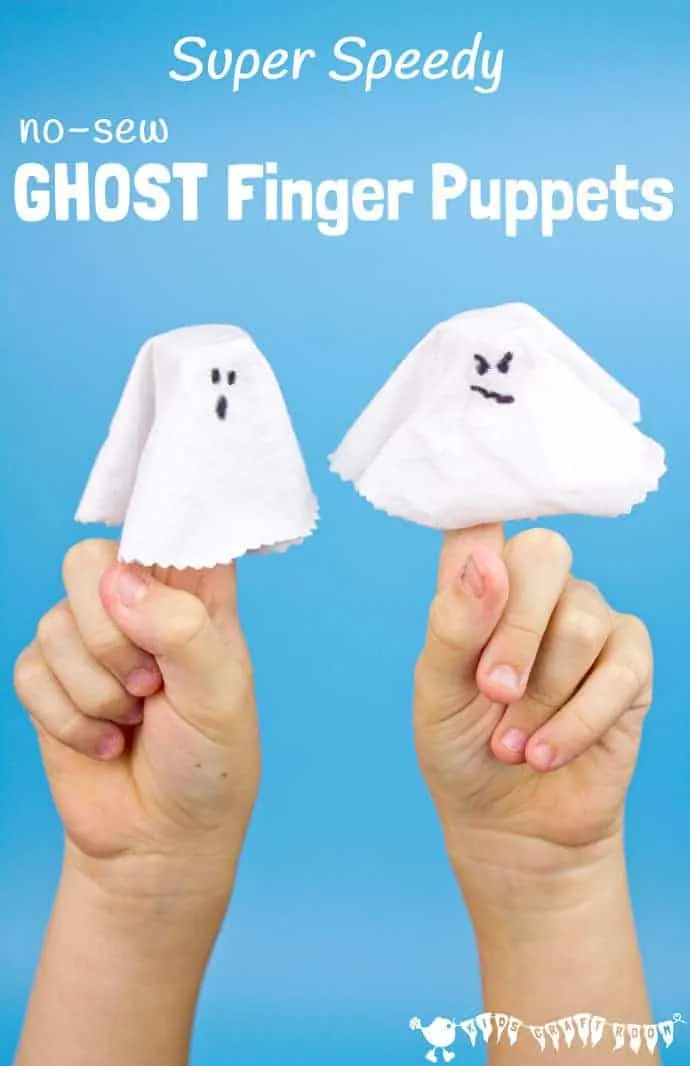 Two white GHOST FINGER PUPPETS on a child's fingers. They are made from white fabric with drawn on faces in black ink.