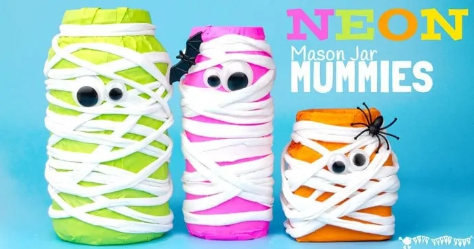 This Halloween make spooky Neon Mason Jar Mummies. These colourful mummies look great day and night! Fill them with candy or tea lights for Mummy Lanterns.