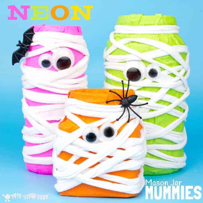 MASON JAR MUMMIES - This Halloween make spooky Neon Mason Jar Mummies. These colourful mummies look great day and night! Fill them with candy or tea lights for Mummy Lanterns.