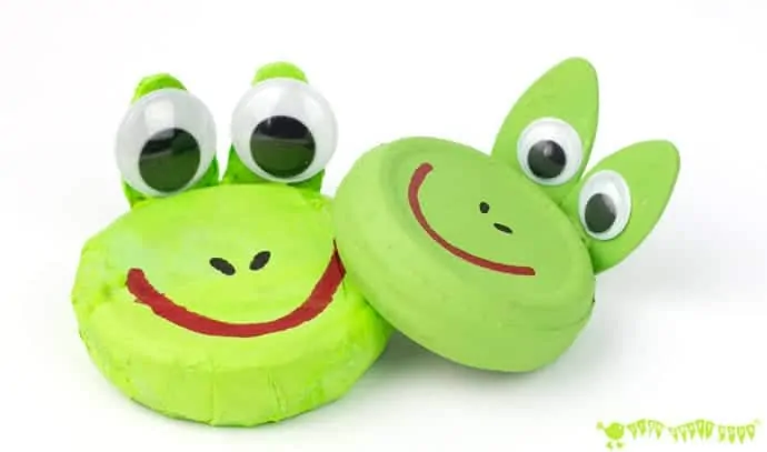 CROAKING FROG CRAFT - Recycle jar lids to make a squeeze 'n' croak frog toy. These little homemade frogs really croak! A fun kids craft to go with nursery rhymes and story telling. RIBBIT! 