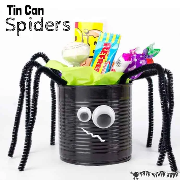 A close up of a black tin can spider with black pipe cleaner legs.