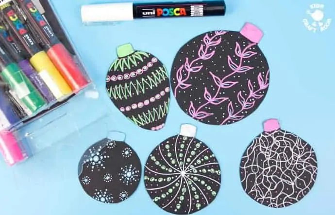 Make vibrant and gorgeous homemade baubles to hang on your Christmas tree. These DIY Christmas ornaments are a great Posca Pen craft for kids and grown ups.