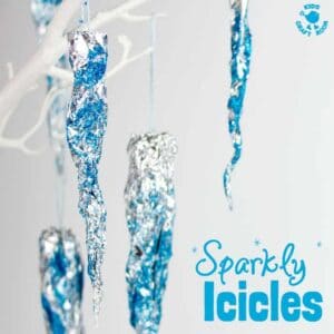 WINTER ICICLE CRAFT - This Sparkly Icicle Craft is a fun Winter craft for kids. Used as Christmas ornaments or for snowy displays they brings the beauty & magic of Winter inside. #Winter #WinterCrafts #WinterCraftIdeas #Icicles #IcicleCraft #WinterArt #WinterActivity #WinterActivitiesForKids #KidsCrafts #CraftsForKids #WinterCraftIdeas