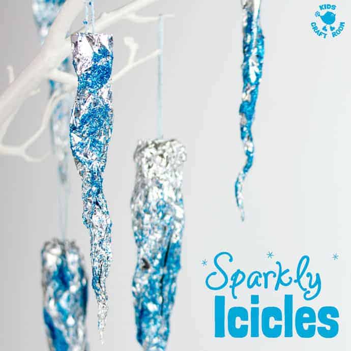 WINTER ICICLE CRAFT - This Sparkly Icicle Craft is a fun Winter craft for kids. Used as Christmas ornaments or for snowy displays they brings the beauty & magic of Winter inside. #Winter #WinterCrafts #WinterCraftIdeas #Icicles #IcicleCraft #WinterArt #WinterActivity #WinterActivitiesForKids #KidsCrafts #CraftsForKids #WinterCraftIdeas