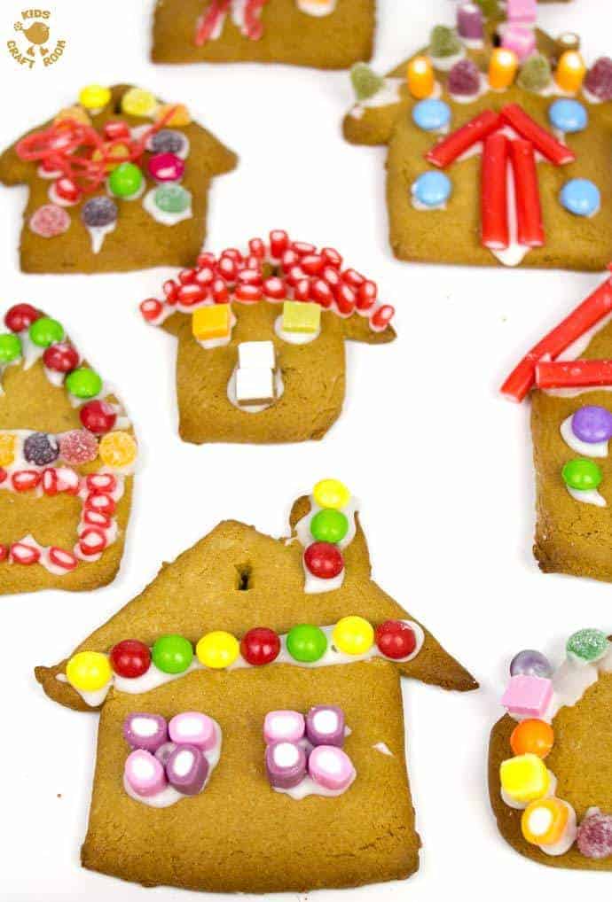 This easy gingerbread house recipe is great fun for the whole family. Forget the frustrations of 3D houses that fall down and make pretty 2D gingerbread houses instead. Just as pretty and delicious but without all the hassle! These cute gingerbread houses can be hung on the Christmas tree and given as gifts too.