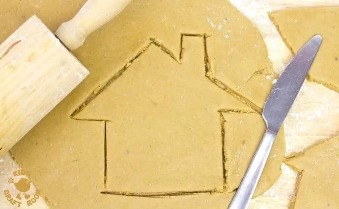 This easy gingerbread house recipe is great fun for the whole family. Forget the frustrations of 3D houses that fall down and make pretty 2D gingerbread houses instead. Just as pretty and delicious but without all the hassle! These cute gingerbread houses can be hung on the Christmas tree and given as gifts too-step 1