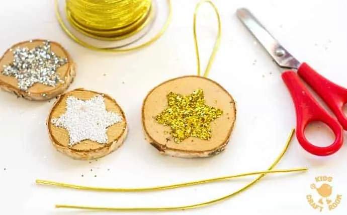 SPARKLY STAR WOOD SLICE ORNAMENTS are a quick and easy Christmas craft. These DIY Wooden Christmas Ornaments are a gorgeous combination of natural and bling! step 4 