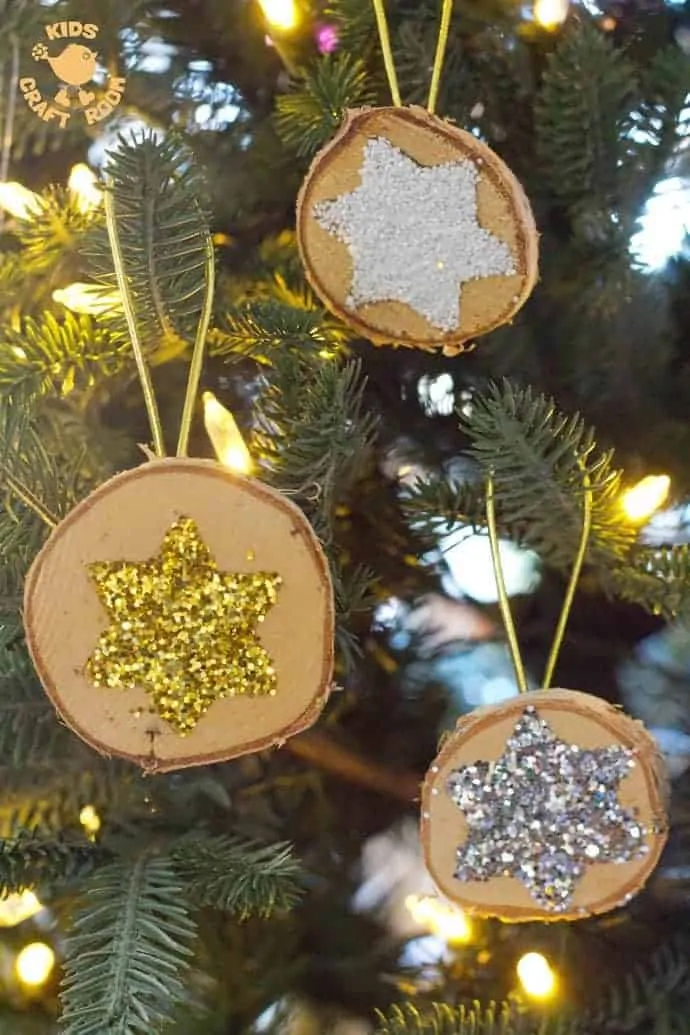 SPARKLY STAR WOOD SLICE ORNAMENTS are a quick and easy Christmas craft. These DIY Wooden Christmas Ornaments are a gorgeous combination of natural and bling! 