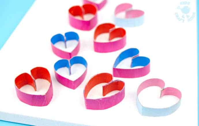 3D CARDBOARD TUBE HEART ART recycles TP rolls into beautiful pictures! Introduce kids to art that isn't flat! Working in 3D can be very exciting! 3D Heart Art is a lovely Valentine's Day craft for kids and makes adorable homemade gifts for Mother's Day or Grandparent's Day.