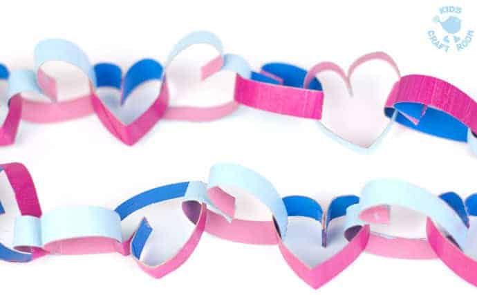 TP Roll Cardboard Tube Heart Garlands look gorgeous! Heart chains make great Valentine's Day or Mother's Day decorations. A fun and easy recycled heart craft for kids.