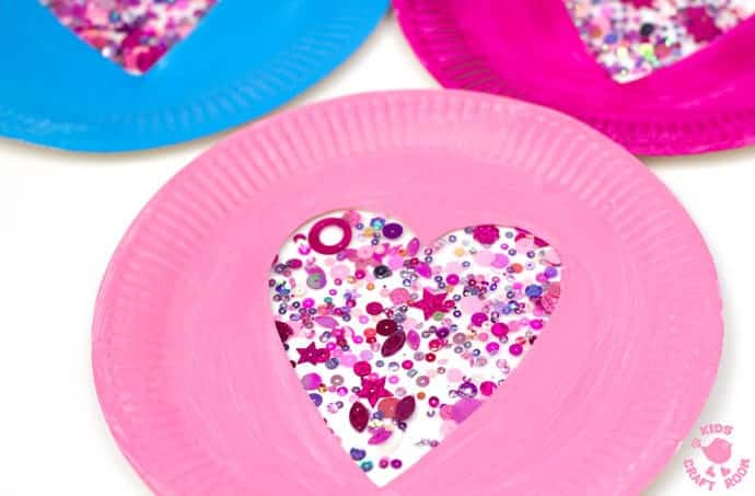 This PAPER PLATE HEART SUNCATCHER CRAFT is gorgeous! A simple heart craft perfect for Valentine's Day, Mother's Day and Summer. Great for all ages from toddlers to tweens.