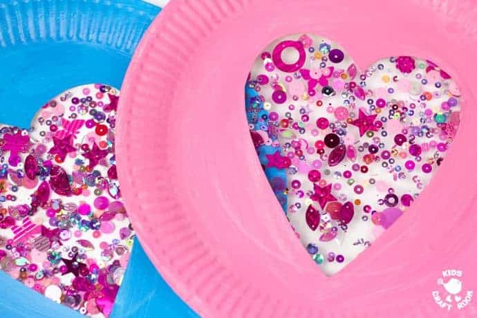 This PAPER PLATE HEART SUNCATCHER CRAFT is gorgeous! A simple heart craft perfect for Valentine's Day, Mother's Day and Summer. Great for all ages from toddlers to tweens.
