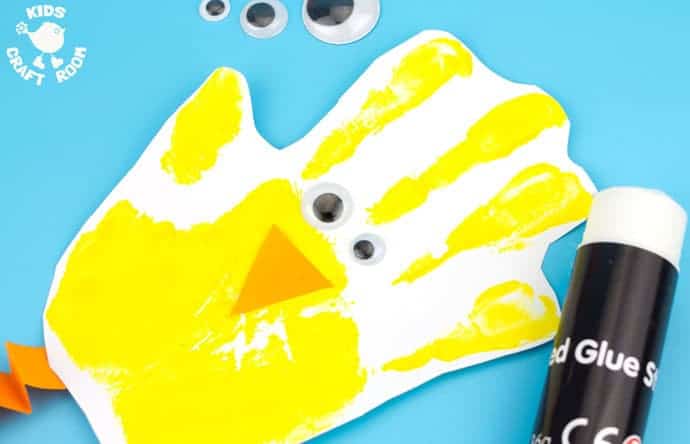 Handprint Chick Puppet Craft step 5 - Handprint Chick Puppets are a great Spring craft or Easter craft for kids. This chick craft looks super cute and kids can actually play with them too! Such a fun handprint craft to encourage dramatic play and story telling.