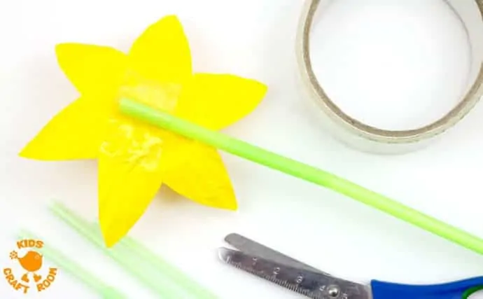 POP UP DAFFODIL CRAFT Step 6 - A simple Spring craft perfect for Easter or Mother's Day too. This cupcake liner and paper plate flower craft lets kids pretend to grow their own daffodils again and again! 