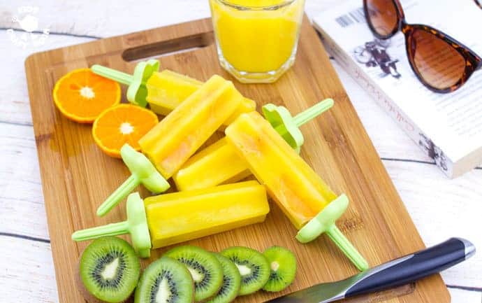 Ice Lollies Are An Easy Way To Enjoy A #FruitJuiceBoost - Have you tried a daily #FruitJuiceBoost for your kids? It's such an easy way to give them one of their recommended portions of fruit and vegetables every day. Here are my favourite ways to enjoy a serving of pure fruit juice every single day.