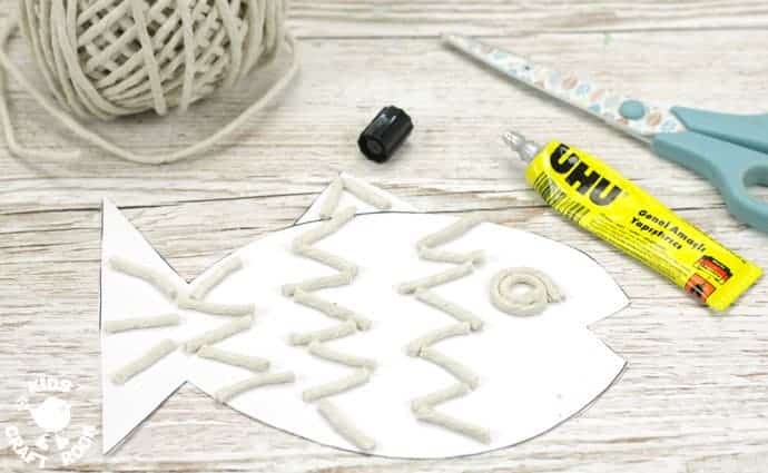Step 2 - EMBOSSED FOIL FISH PUPPETS - A stunning fish craft with a difference! This embossed foil fish craft appeals to kids of all ages. Enjoy making fish puppets or fish pictures, the results are gorgeous!