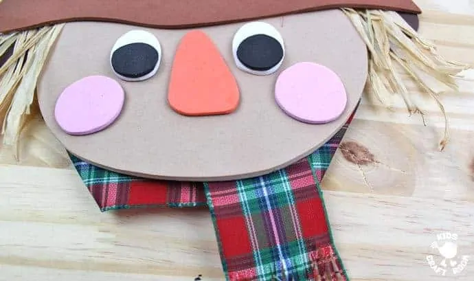 Step 10 - FOAM SCARECROW CRAFT - This cute foam scarecrow craft is great as a Fall craft or for harvest time and Thanksgiving. A free printable scarecrow template makes it super easy and fun to make.