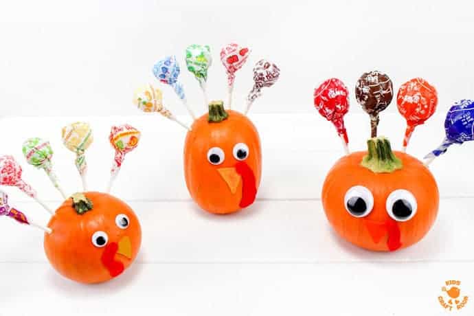 LOLLIPOP PUMPKIN TURKEYS - an easy turkey craft for kids. This fun Fall nature craft and Thanksgiving craft makes a tasty table centrepiece the whole family will enjoy. Load the cute turkeys with all your favourite flavoured suckers. What a treat! Gobble, gobble, yum!