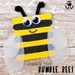 POPSICLE STICK BEE CRAFT - Here's something to get you buzzing! These bumble bees are easy to make and adorable. With vibrant yellow and black stripes and cleverly made translucent wings they look quite the buzziness! This is such a lovely bee craft for Spring and Summer. #bee #beecrafts #beecraft #kidscrafts #craftsforkids #kidscraftroom #popsiclesticks #posiclestickcrafts #bees #bumblebees #insects #insectcrafts