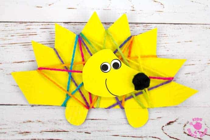 This Yarn Wrapped Paper Plate Hedgehog Craft is sweet, colourful and fun. An adorable Fall craft for preschoolers and great for building fine motor skills! Aren't hedgehog crafts adorable! #hedgehogs #hedgehog #hedgehogcrafts #hedgehogcraft #fallcrafts #autumncrafts #kidscrafts #paperplatecrafts #yarn #yarnwrapping #yarncrafts #kidsactivities #kidscraftroom