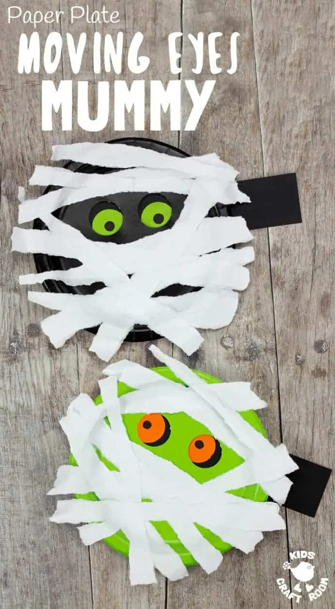 A black and a green paper plate mummy craft with moving eyes. They are looking at each other.