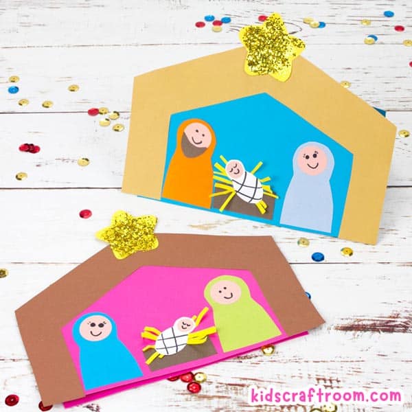 A square image showing two nativity Christmas cards.One is lying down and one is standing up. they both show paper Mary, Joseph and Baby Jesus in a manger.