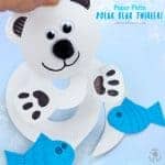 How fun is this Paper Plate Polar Bear Twirler? Hold it high and give it a blow to watch it go, go go! This is a lovely interactive Winter craft for kids that's really easy to make with paper plates. Paper plate twirlers are so fun! #kidscraftroom #polarbears #wintercrafts #wintercraftsforkids #paperplates #paperplatecrafts #twirler #whirligig #kidscrafts #toddlercrafts #preschoolcrafts #easycraftsforkids #easycrafts #spinners
