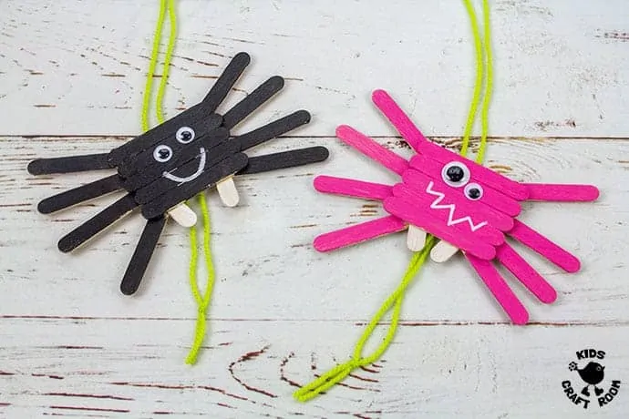 Climbing Popsicle Stick Spider Craft finished in pink