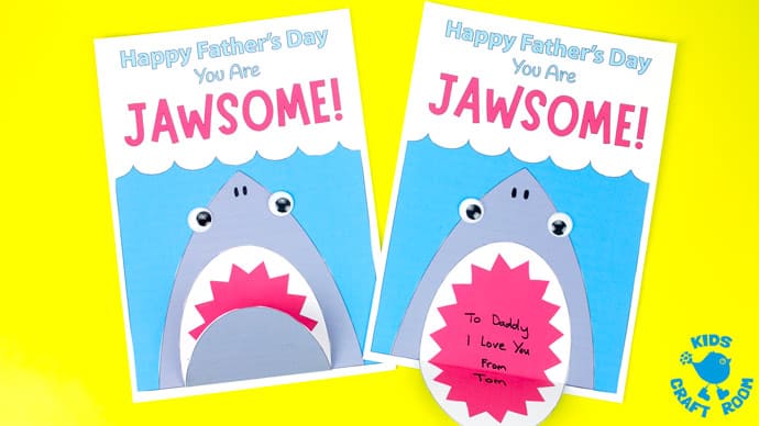 Shark Father's Day Card side by side on a yellow table top. 