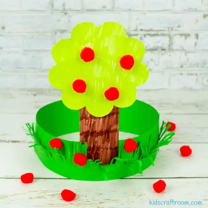Apple Tree Hat Craft on white table top.
