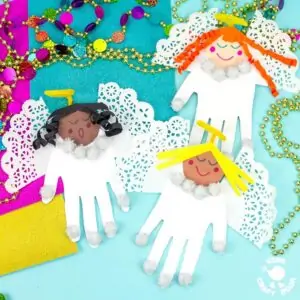 Three angels made from white handprints. they have round paper heads and coloured paper hair.