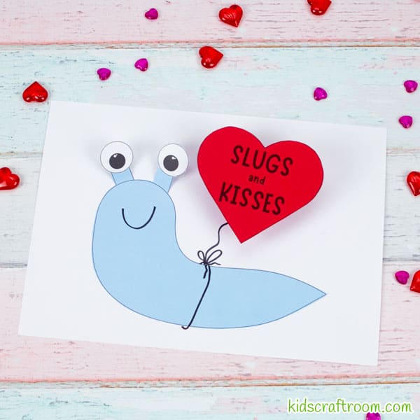 Slugs and Kisses Valentine Craft - square image of blue slug holding a red heart balloon.