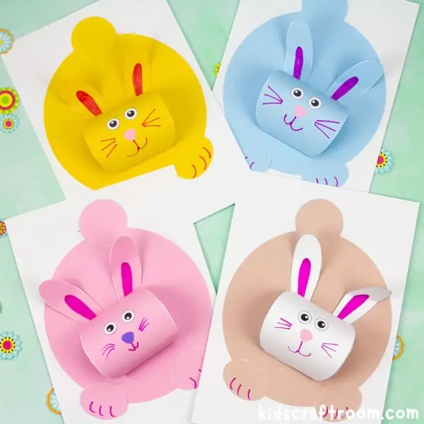 4 bunny crafts in a square. One yellow, blue, pink and brown.